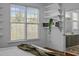 Bright bedroom featuring hardwood floors, built in shelves and ensuite bathroom access at 703 Copperline Dr # 301, Chapel Hill, NC 27516