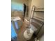 Bathroom featuring a shower/bathtub, toilet and sink with window at 706 Orchard Dr, Graham, NC 27253