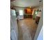 Compact kitchen featuring wood cabinets and efficient layout, ready for upgrades at 706 Orchard Dr, Graham, NC 27253