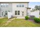 Backyard featuring privacy fence, air conditioning unit, and green bushes at 72 S Grey Abbey Dr, Clayton, NC 27527