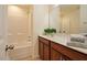 Bathroom featuring a tub, vanity, mirror, and decorative towels at 72 S Grey Abbey Dr, Clayton, NC 27527