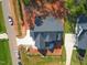 Aerial view of new construction home with driveway at 7301 Wexford Woods Ln, Wake Forest, NC 27587