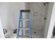 Bathroom with a white-tiled shower and sink at 7301 Wexford Woods Ln, Wake Forest, NC 27587