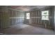 Comfortable bedroom featuring two windows and a neutral color palette, ideal for relaxation and personalization at 7301 Wexford Woods Ln, Wake Forest, NC 27587