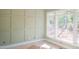 Bedroom with board and batten accent wall and natural light at 7301 Wexford Woods Ln, Wake Forest, NC 27587
