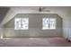 Bonus room with wainscoting and natural light at 7301 Wexford Woods Ln, Wake Forest, NC 27587