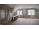 Versatile bonus room with dormer windows, perfect for customization as a playroom or home office at 7301 Wexford Woods Ln, Wake Forest, NC 27587