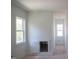 Hallway with natural light, trim detail, and easy access panel at 7301 Wexford Woods Ln, Wake Forest, NC 27587