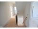 Hallway with stairs leading to the upper level at 7301 Wexford Woods Ln, Wake Forest, NC 27587