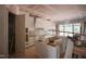 Spacious unfinished kitchen with white cabinets, an island, and large windows at 7301 Wexford Woods Ln, Wake Forest, NC 27587
