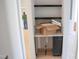 Dry bar with shelving and base cabinets at 7301 Wexford Woods Ln, Wake Forest, NC 27587
