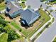 Aerial view of a two-story home with a fenced yard in a suburban neighborhood at 7510 Latteri Ct, Raleigh, NC 27613