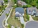 Aerial view of a well-maintained home with a landscaped yard and inviting curb appeal at 7510 Latteri Ct, Raleigh, NC 27613