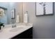 Elegant bathroom with a sleek vanity, stylish mirror, and modern fixtures, perfect for everyday use at 7510 Latteri Ct, Raleigh, NC 27613