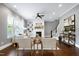 Spacious living room with fireplace, built-in shelves, and comfortable seating at 7510 Latteri Ct, Raleigh, NC 27613