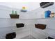 Shelving in the pantry, with a variety of food and beverage items neatly organized at 7510 Latteri Ct, Raleigh, NC 27613