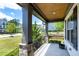 View from the porch shows the lush landscaping, street view and neighborhood charm at 7510 Latteri Ct, Raleigh, NC 27613