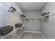 Walk-in closet featuring wire shelving and ample storage space, designed for optimal organization at 7510 Latteri Ct, Raleigh, NC 27613