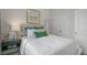 Comfortable bedroom with plush bedding, stylish decor, and ample natural light at 766 Dorset Stream Dr, Fuquay Varina, NC 27526