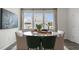 Inviting dining area filled with natural light and a decorative table setting at 766 Dorset Stream Dr, Fuquay Varina, NC 27526