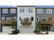 Townhome exterior featuring private balconies and a two-car garage at 766 Dorset Stream Dr, Fuquay Varina, NC 27526