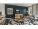 Stylized living room featuring bold accent wall and contemporary furnishings at 766 Dorset Stream Dr, Fuquay Varina, NC 27526