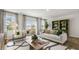 Bright living room with lots of natural light and stylish modern decor at 766 Dorset Stream Dr, Fuquay Varina, NC 27526