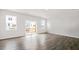 Bright living room with windows and sliding glass door to the outside deck at 768 Dorset Stream Dr, Fuquay Varina, NC 27526