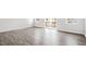 Spacious living room features wood flooring and light gray colored walls at 768 Dorset Stream Dr, Fuquay Varina, NC 27526