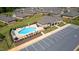 Aerial view showcasing community pool and clubhouse, set within the neighborhood at 769 Ashley Woods Dr, Gibsonville, NC 27249