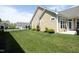Nicely kept backyard, fenced and landscaped, offering privacy and outdoor space at 769 Ashley Woods Dr, Gibsonville, NC 27249