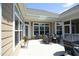 Outdoor patio with a dining set and a grill, perfect for entertaining at 769 Ashley Woods Dr, Gibsonville, NC 27249
