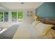 Serene bedroom featuring natural light, a large closet, and a comfortable queen-size bed with soft linens at 7955 Midnight Ln, Wake Forest, NC 27587