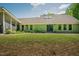 A well-manicured lawn and lush landscaping accentuate this home's charming facade with ample natural light at 7955 Midnight Ln, Wake Forest, NC 27587