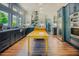 Bright kitchen with stainless appliances, farmhouse sink, tile backsplash, and center island at 7955 Midnight Ln, Wake Forest, NC 27587