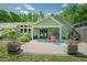 Outdoor patio area with a cozy seating arrangement and a grill, perfect for entertaining guests at 7955 Midnight Ln, Wake Forest, NC 27587