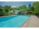 Sparkling in-ground pool with ample space and backyard seating for outdoor enjoyment and relaxation at 7955 Midnight Ln, Wake Forest, NC 27587