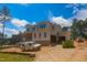 Side view of a new construction two-story home on a sunny day at 7961 Wexford Waters Ln, Wake Forest, NC 27587
