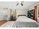 Bright bedroom featuring hardwood floors, natural light and modern decor at 8 Bluebell Ct, Durham, NC 27713