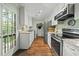 Bright kitchen with stainless steel appliances and granite countertops at 8 Bluebell Ct, Durham, NC 27713