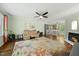 Spacious living room featuring hardwood floors, a fireplace, and a built in bookshelf at 8 Bluebell Ct, Durham, NC 27713