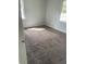 Neutral bedroom with carpet, light gray walls, and great sunlight at 801 E Highland Ave, Rocky Mount, NC 27801