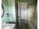 The bathroom features a stylish vanity and lots of storage space at 83 Brentwood Dr, Selma, NC 27576