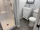 This bathroom features a sleek shower and stylish vanity at 83 Brentwood Dr, Selma, NC 27576