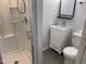 This bathroom features a sleek shower and stylish vanity at 83 Brentwood Dr, Selma, NC 27576