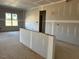 Bright living room with large window and ample space, perfect for relaxation and entertaining at 871 Olive Branch Dr, Smithfield, NC 27577