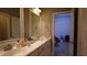 Bathroom featuring a double sink vanity with marble countertop at 901 Hollymont Dr, Holly Springs, NC 27540