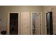 This bathroom shows doors to a closet, water closet, and an adjacent room at 901 Hollymont Dr, Holly Springs, NC 27540