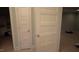 Hallway with tile flooring and bright white trim, doors, and walls at 901 Hollymont Dr, Holly Springs, NC 27540