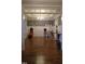 Versatile dining/office space boasting hardwood floors, natural light and architectural molding at 901 Hollymont Dr, Holly Springs, NC 27540